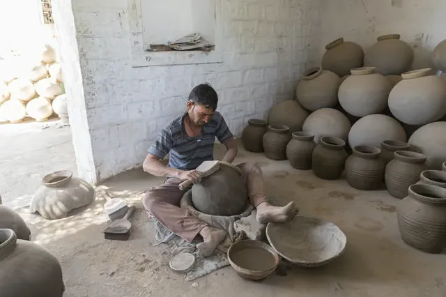 A potter in the Bishnoi village Shutterstock.com
